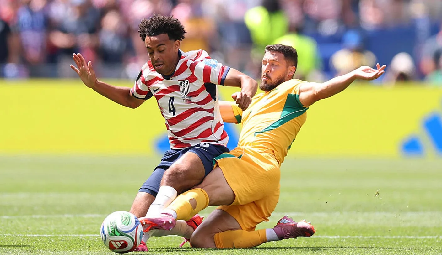 Socceroos secure place in World Cup last 32 after nerve-shredding draw with Paraguay