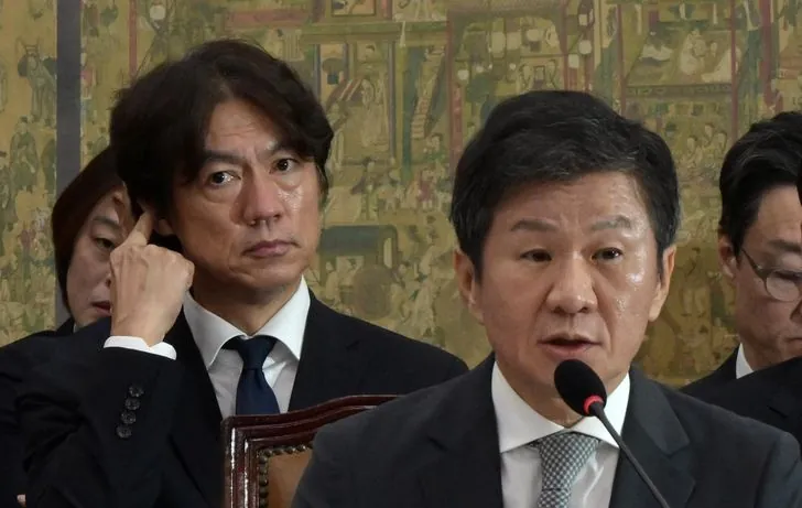 Chung Mong-gyu, right, president of the Korea Football Association (KFA), answers questions from lawmakers during a parliamentary inquiry on the KFA at the National Assembly in Seoul, Sept. 24, 2024. Left is Hong Myung-bo, former head coach of the Korean men's national football team. Korea Times file
