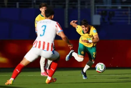 Cristian Volpato looks to take his man on.