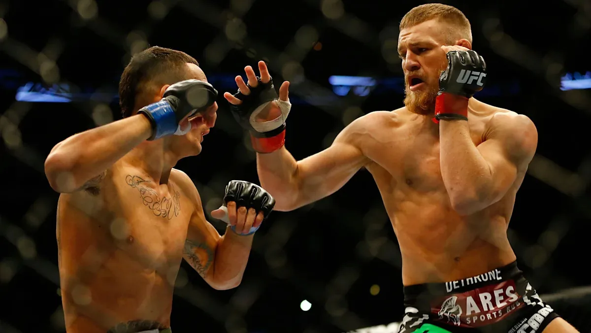 McGregor injures leg on opening kick vs. Holloway at UFC 329