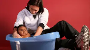 A photograph taken in December 2007, featuring a 20-year-old Lionel Messi bathing a five-month-old Lamine Yamal for a charity photoshoot, has gained renewed attention as the two players are set to face each other in the World Cup final. This upcoming match between Spain and Argentina marks their first encounter on a football pitch.