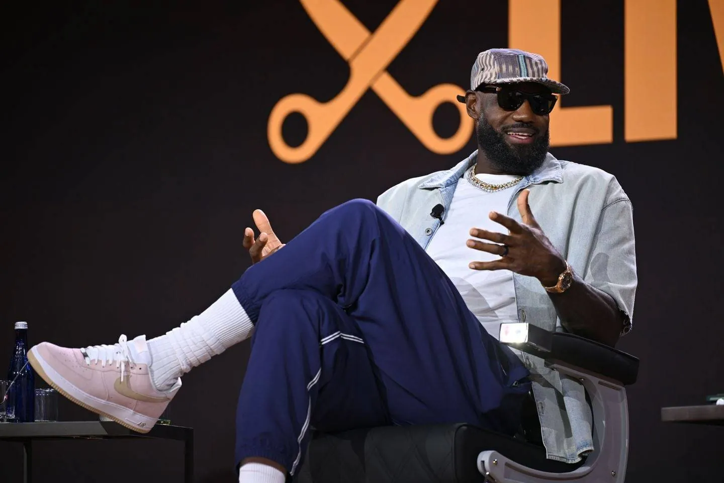 LeBron James sits during an appearance at Fanatics Fest in New York.