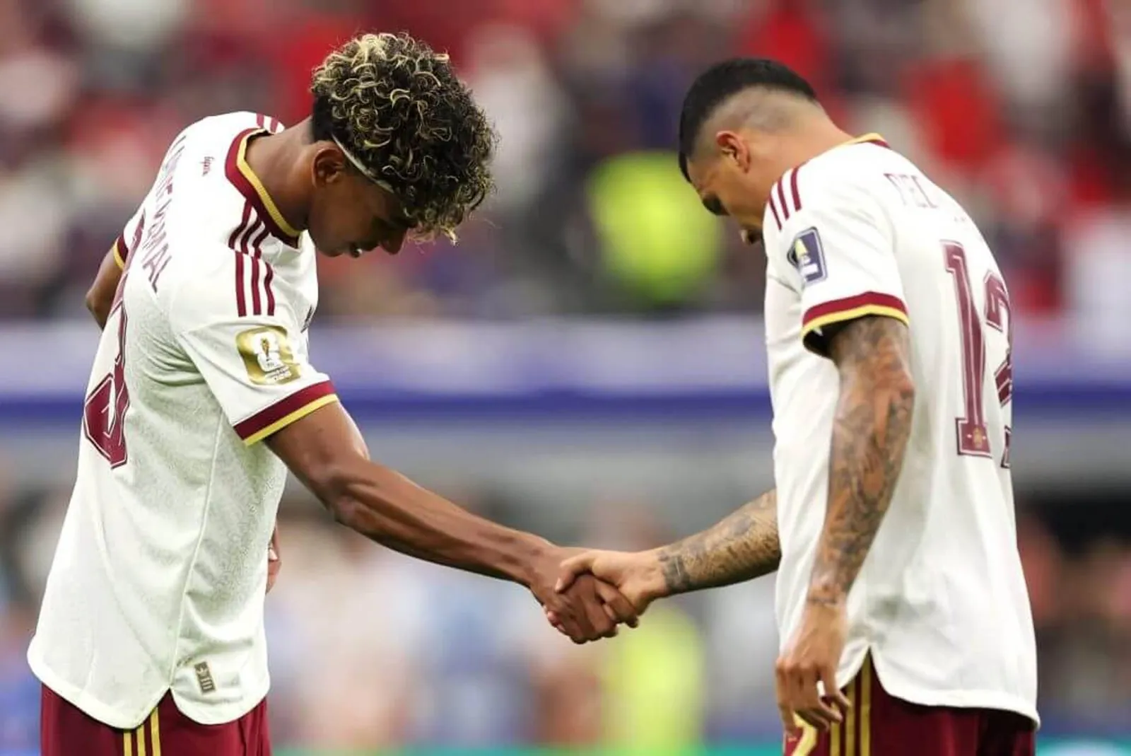 Lamine Yamal and Pedro Porro celebrate the second goal by shaking hands